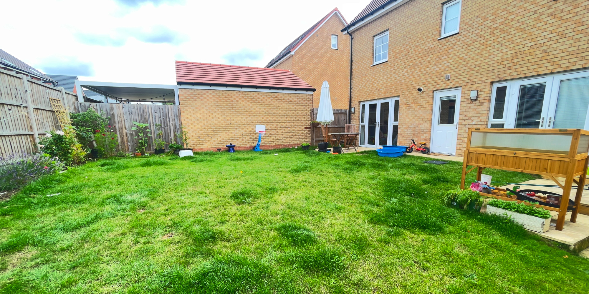 New-build garden in Milton Keynes shown as a blank canvas ready for design
